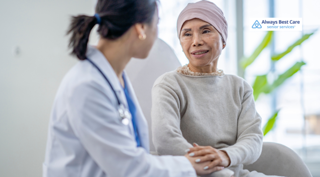 Doctor reassuring a patient wearing a headscarf during a consultation.