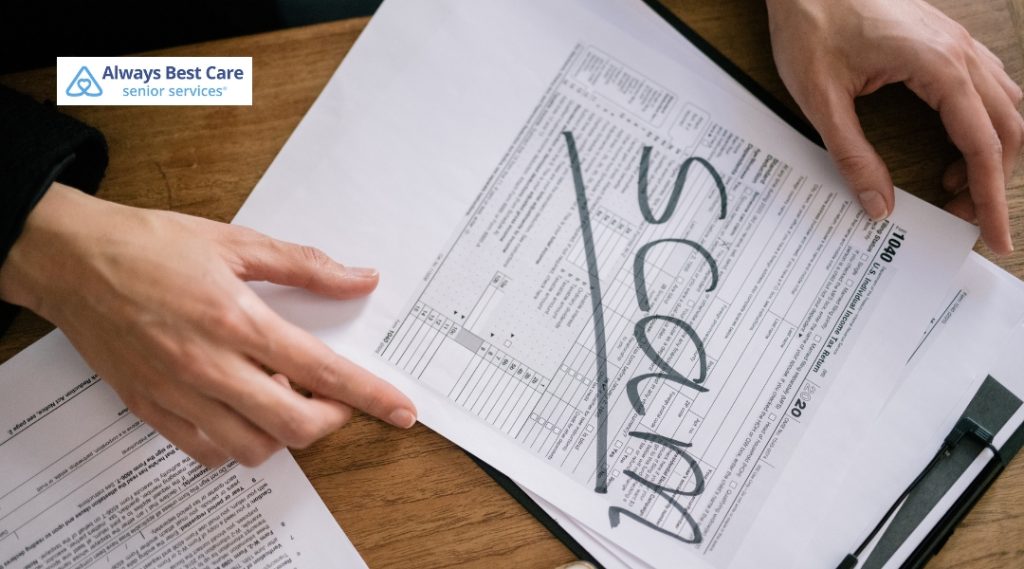 Pages with the writing 'scam' written on them