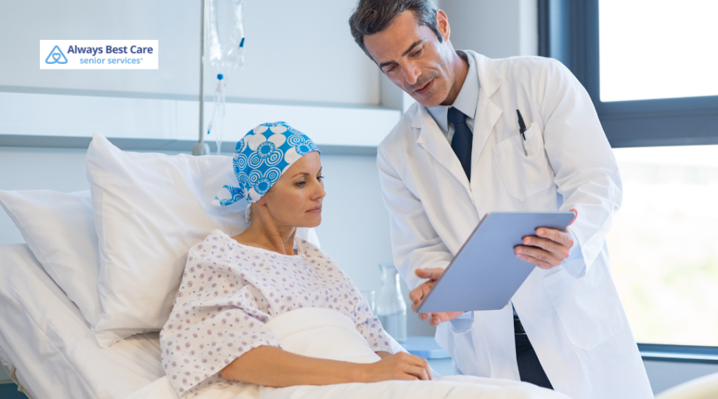 Doctor reviewing medical information with a patient in a hospital bed.