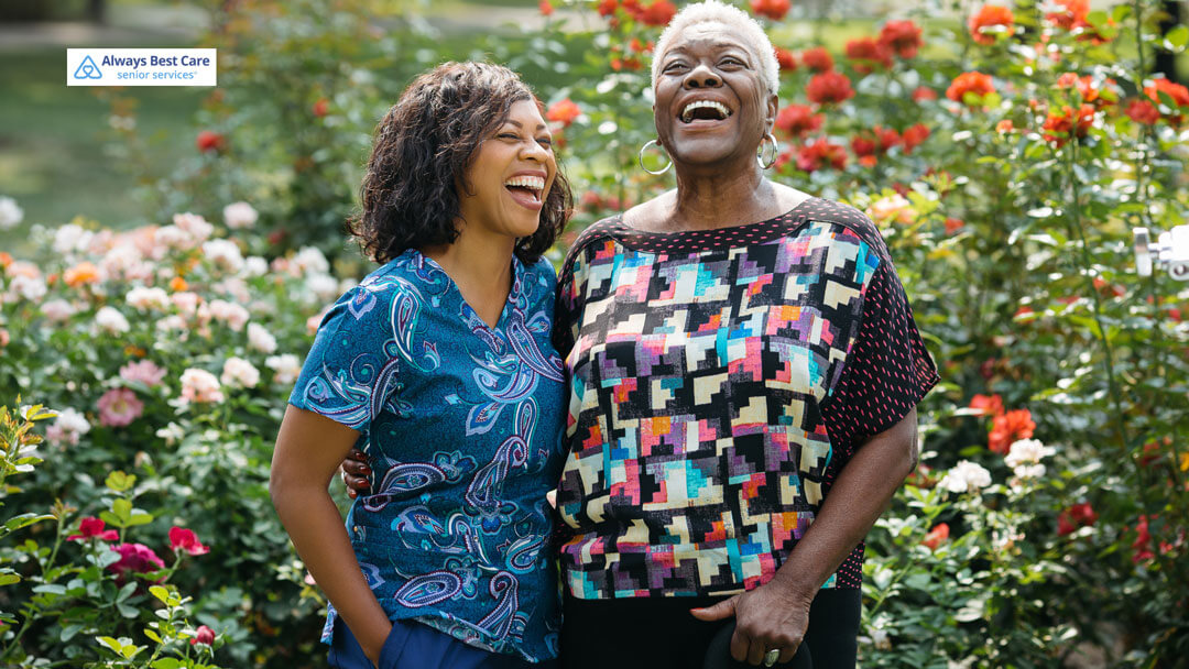 caregiver and patient laughing