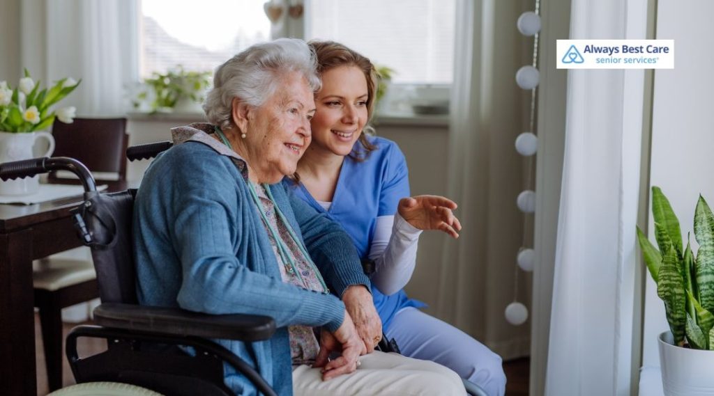 Senior woman receiving companionship and assistance from a caregiver during in-home care