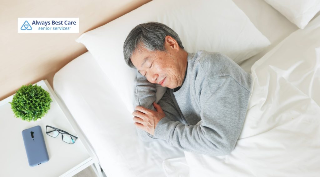 Peaceful senior man sleeping soundly in a comfortable bed