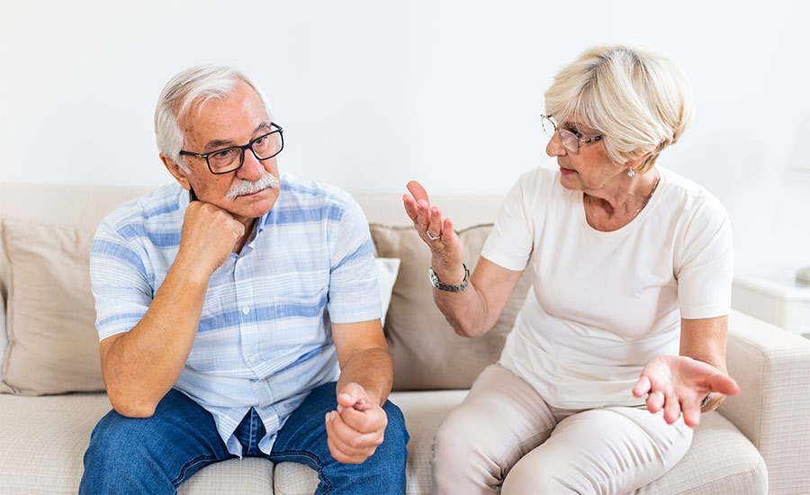 An elderly couple having a disagreement​