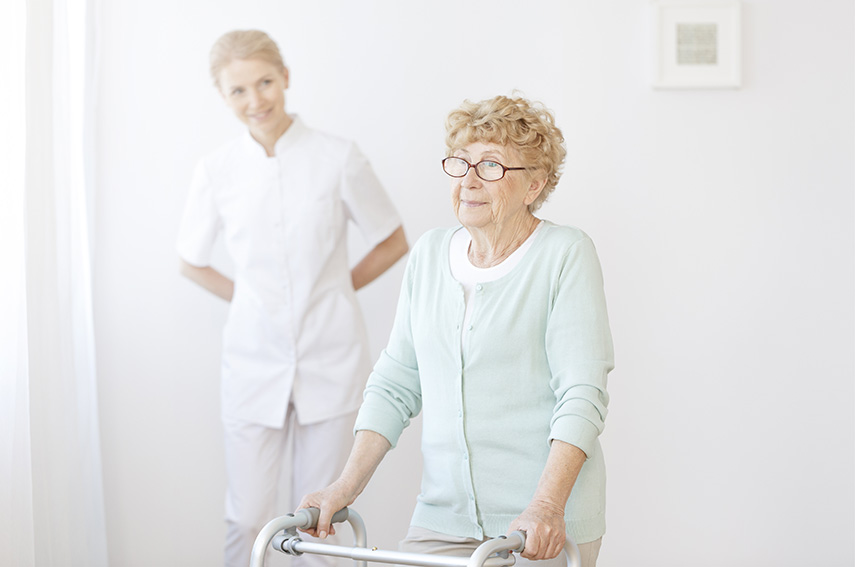 female care giver and an old woman