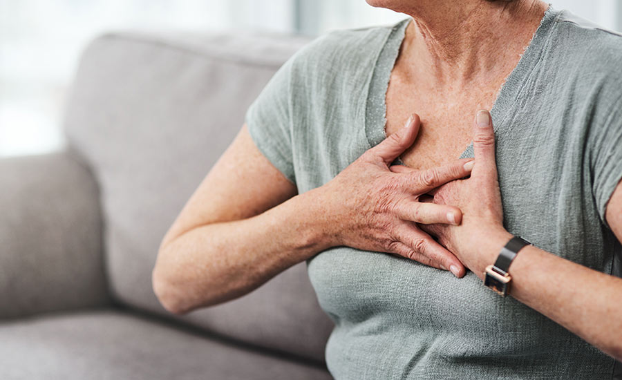 An elderly woman experiencing shortness of breath​